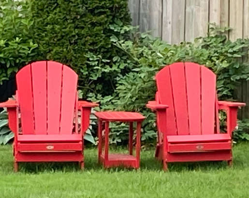 Timperley Family - red chairs photo